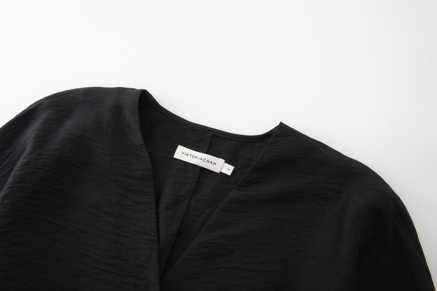 Opame cape top