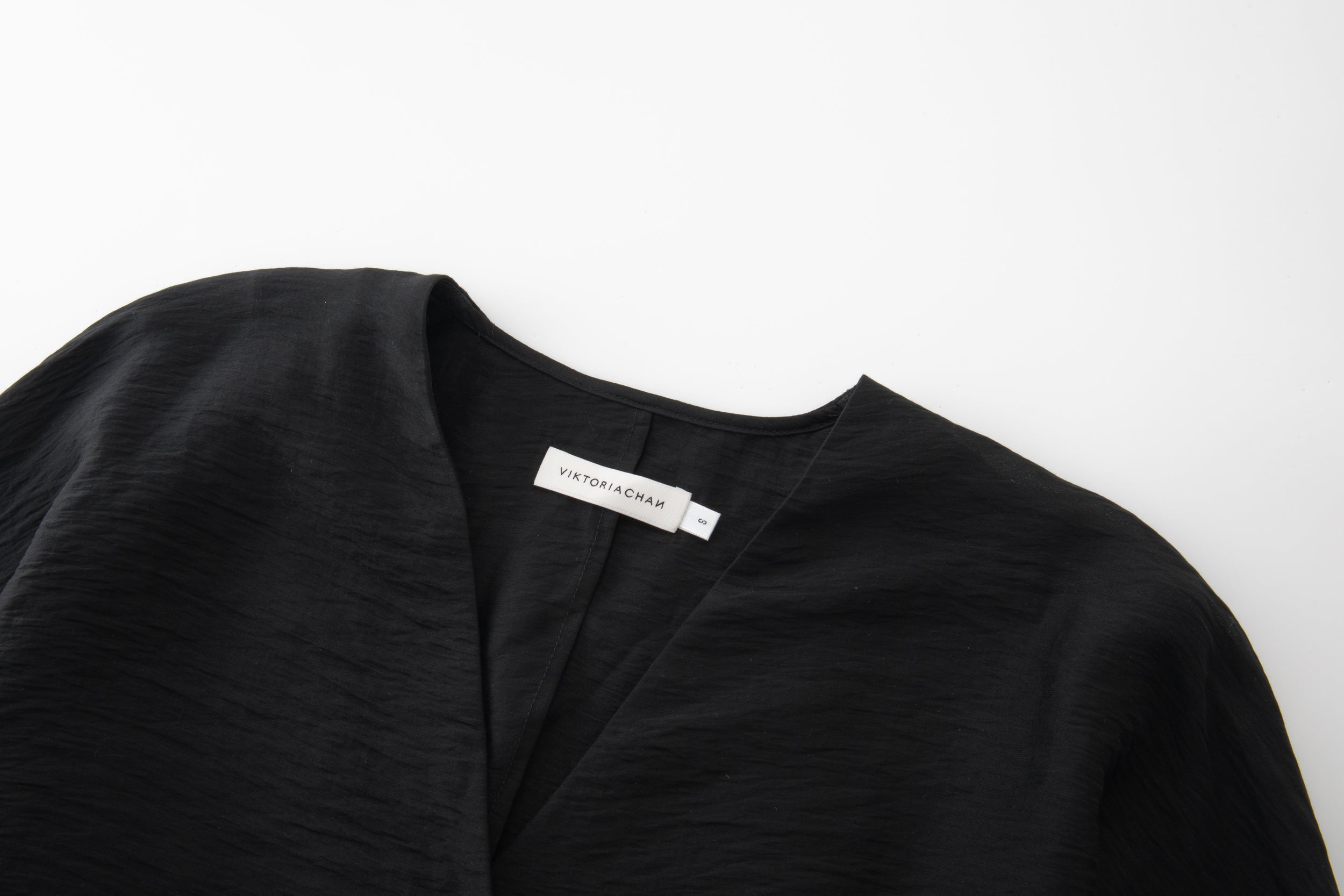 Opame cape top